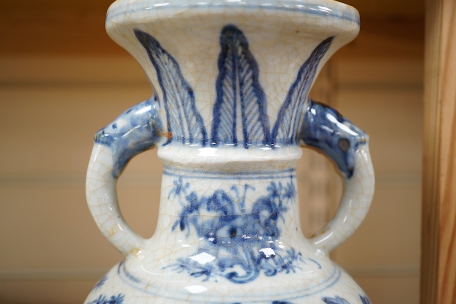 A Chinese blue and white crackle glazed two handled vase, 28cm. Condition - good